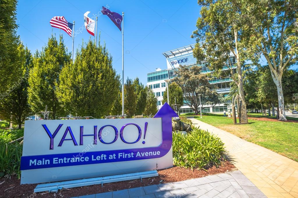 Sunnyvale, California, United States - August 15, 2016: flags in front of Yahoo Headquarters with American Flag and flag with Yahoo icon. Yahoo is a multinational technology company.