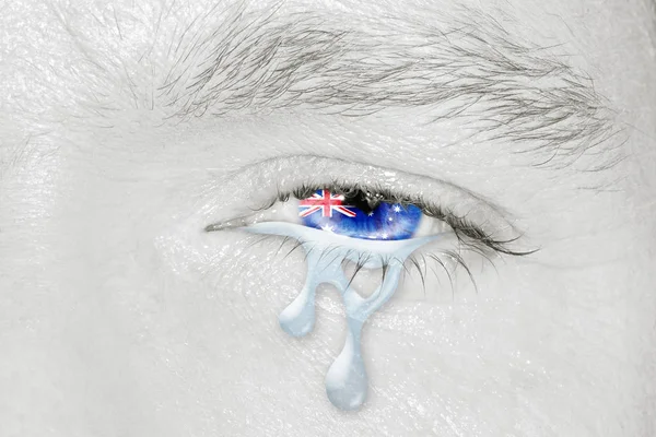 Плачущий глаз с австралийским флагом — стоковое фото