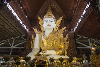 Gigantic Buddha image in Ngahtatgyi temple, Yangon, Myanmar clipart