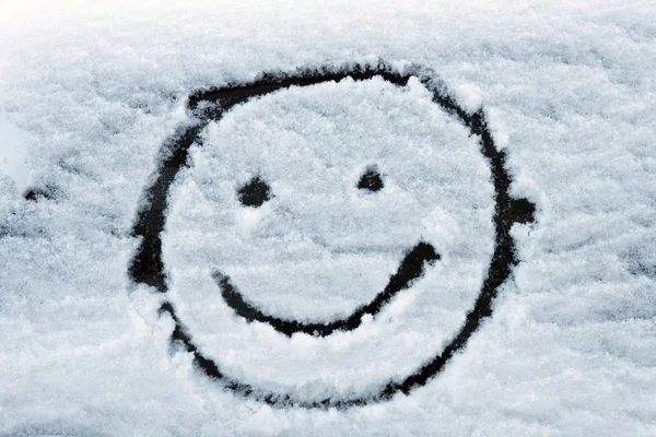 Smiley face on snow