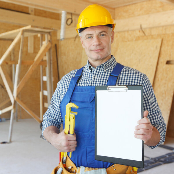 Workman with wrench