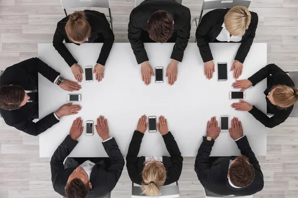 Negócios com telefones celulares — Fotografia de Stock