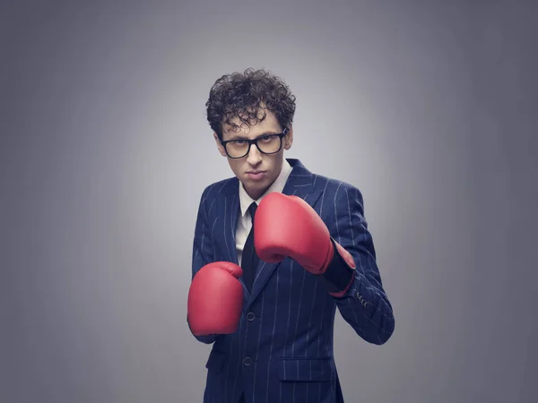 Businessman in boxing gloves