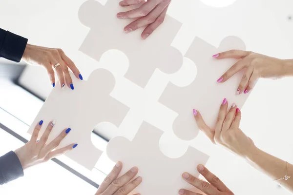 Hands holding puzzle — Stock Photo, Image