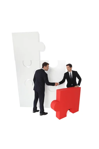 Business and final piece of puzzle — Stock Photo, Image