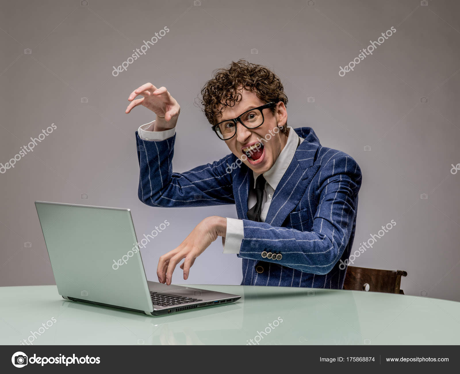 Funny man using laptop — Stock Photo © ALotOfPeople #175868874, image size:1600x1300