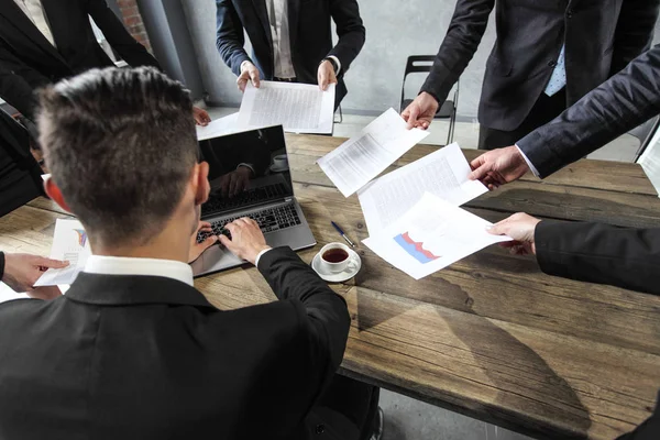 Business man getting extra work — Stock Photo, Image