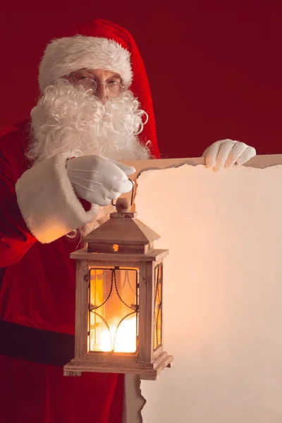Santa Claus con linterna — Foto de Stock