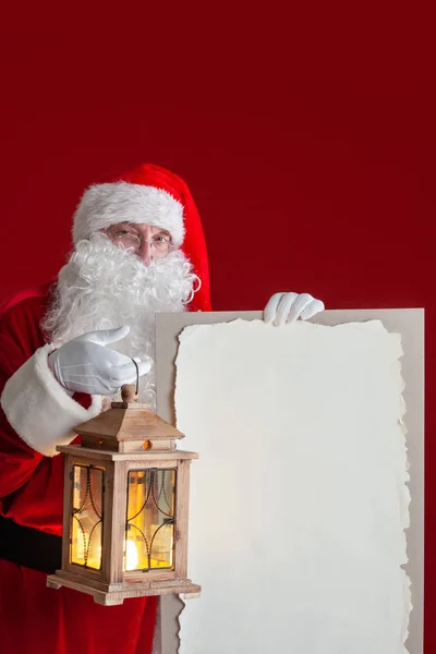 Papai Noel com lanterna — Fotografia de Stock