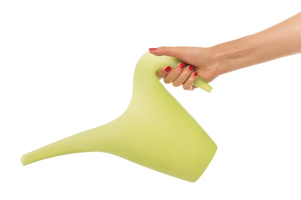 Hand holds watering can. — Stock Photo, Image