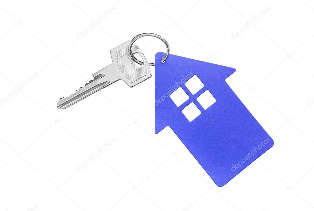 Key and keychain in the shape of a house.