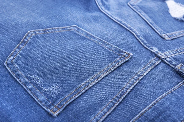 Kapsami Jeans kalhoty. — Stock fotografie