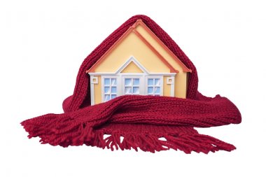 Evin bir eşarp sarılır.