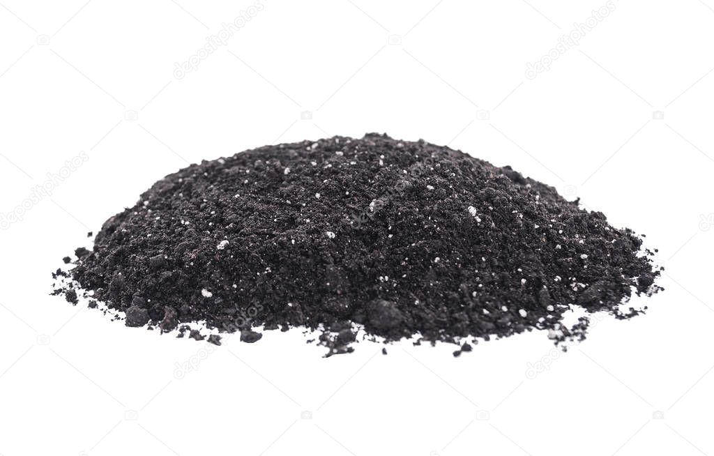 Pile of earth on a white background.