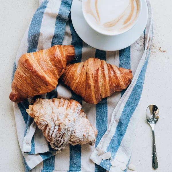 Tasty baking and aromatic coffee in French style — Stock Photo, Image