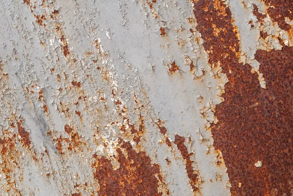 Surface of rusty iron with remnants of old paint texture background — Stock Photo, Image