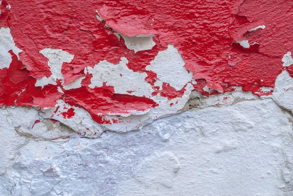 Pintura astillada en una vieja pared de yeso, fondo de textura — Foto de Stock