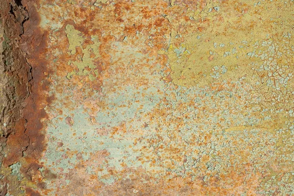 Superficie de hierro oxidado con restos de pintura vieja, fondo de textura —  Fotos de Stock