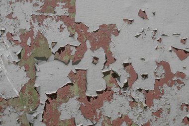 Paslı demir yüzeyi, eski boya kalıntıları, kırık boya, doku arka planı.