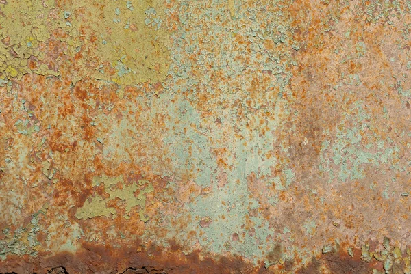 Поверхность ржавого железа с остатками старой краски, щебень краски, текстурный фон — стоковое фото