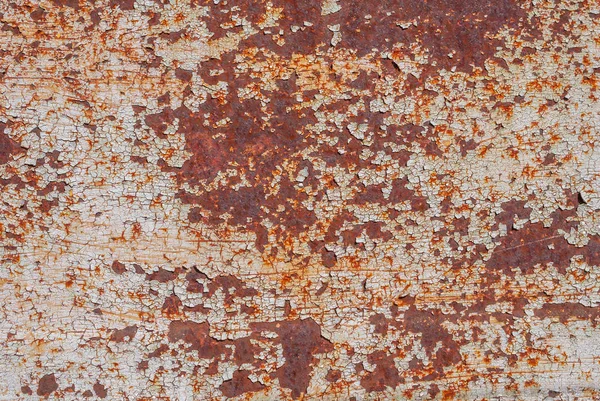 Superficie di ferro arrugginito con resti di vecchia vernice, vernice scheggiata, sfondo texture — Foto Stock