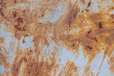 Paslı demir yüzeyi, eski boya kalıntıları, kırık boya, doku arka planı.