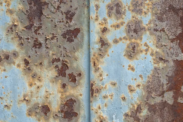 Surface of rusty iron with remnants of old paint, chipped paint, texture background — Stock Photo, Image