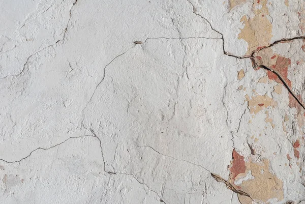 老插话的石膏混凝土墙上裂缝的旧混凝土墙，背景纹理 — 图库照片