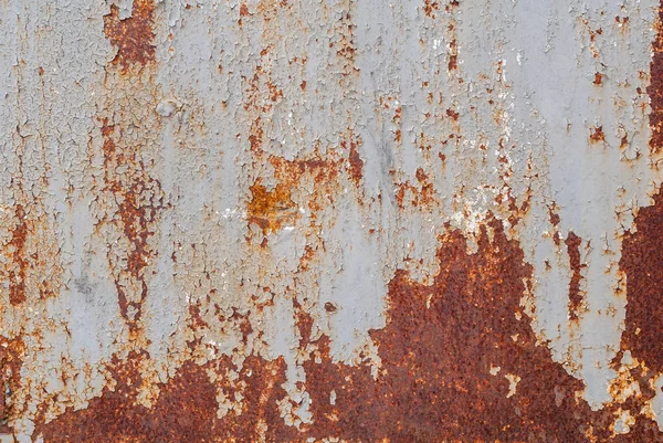 Surface of rusty iron with remnants of old paint, grey texture, background — Stock Photo, Image