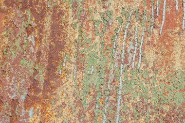 Paslı demir yüzeyi, eski boya kalıntıları, kırık boya, doku arka planı.