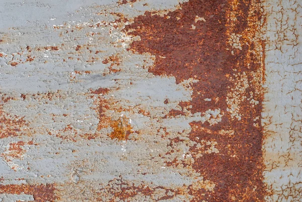 Oberfläche aus rostigem Eisen mit Resten alter Farbe, Texturhintergrund — Stockfoto