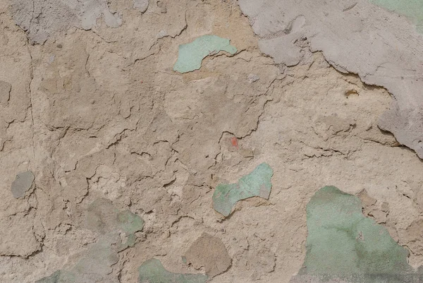 Viejo yeso astillado en la pared de hormigón, pintura astillada, fondo de textura — Foto de Stock