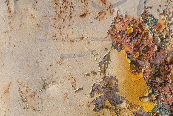 Oppervlak van roestig ijzer met resten van oude verf, gechipte verf, textuur achtergrond — Stockfoto