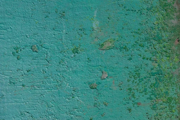 Superficie de hierro oxidado con restos de pintura vieja, textura de color turquesa, fondo — Foto de Stock