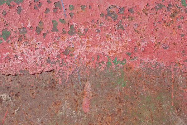 Superficie de hierro oxidado con restos de pintura vieja, textura roja, fondo — Foto de Stock