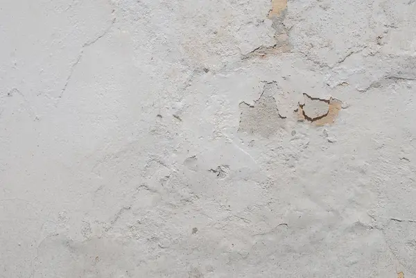 Viejo yeso astillado en la pared de hormigón, fondo blanco, textura — Foto de Stock