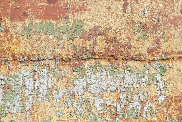 Superfície de ferro enferrujado com restos de tinta antiga, tinta lascada, textura bege, fundo — Fotografia de Stock