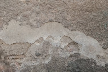 Beton duvar, arka plan, gri doku olarak eski püskü duvar eski yontma sıva