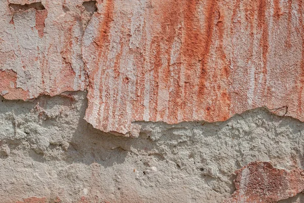 Old chipped plaster on the concrete wall, background texture — Stock Photo, Image