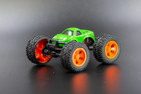 Toy cars on dark background