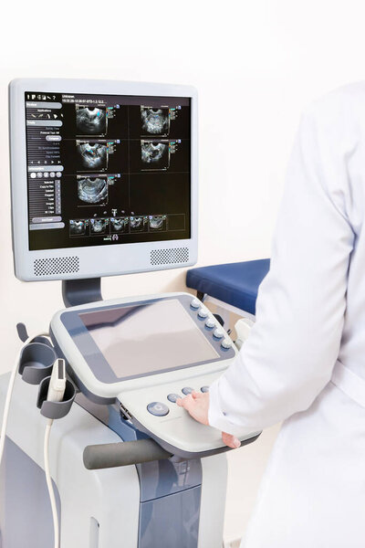 Gynecological room and ultrasound device with photos. Test and ultrasound dating for woman in the clinic.