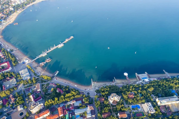 Gelendzhik shooting from a drone. The Central part of the city with a sea pier. City beach