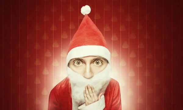 Карикатура на удивлённого Санта Клауса с передачей — стоковое фото