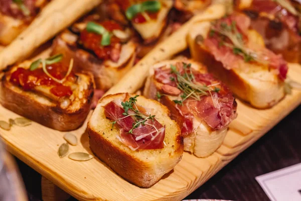 meat snacks with bread on the table