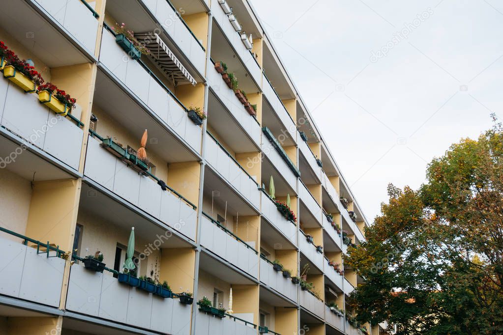 typical plattenbau apartment building with big balcony