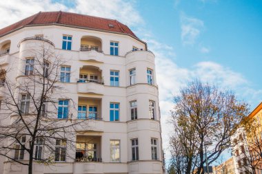 white corner building at autumn