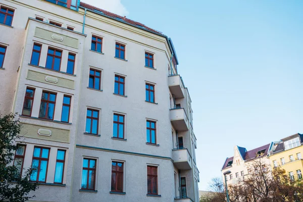 white corner building in a street at district friedrichshain, berlin