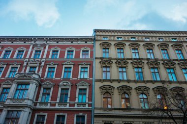 residential red and orange facaded buildings from low angle view