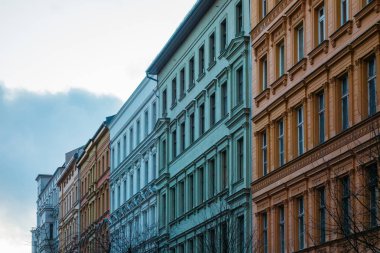 colorful houses in a street at prenzlauer berg with copy space in the sky