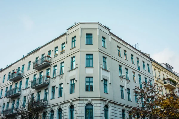 white corner building in cold colors